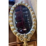 A Victorian oval giltwood and gesso wall mirror, width 80cm, height 152cm