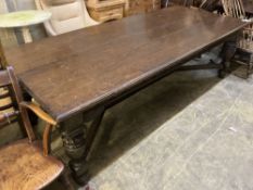 A Victorian oak refectory dining table, on carved bulbous legs, length 244cm, depth 104cm, height