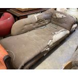 A Victorian chaise longue on turned bun feet, in need of re-upholstery, length 210cm, depth 93cm,