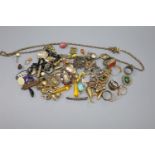 A quantity of assorted mainly 19th century jewellery including mourning brooches, fob seals, stick