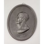 A Wedgwood & Bentley black basalt oval portrait plaque of Marius, length 12cm