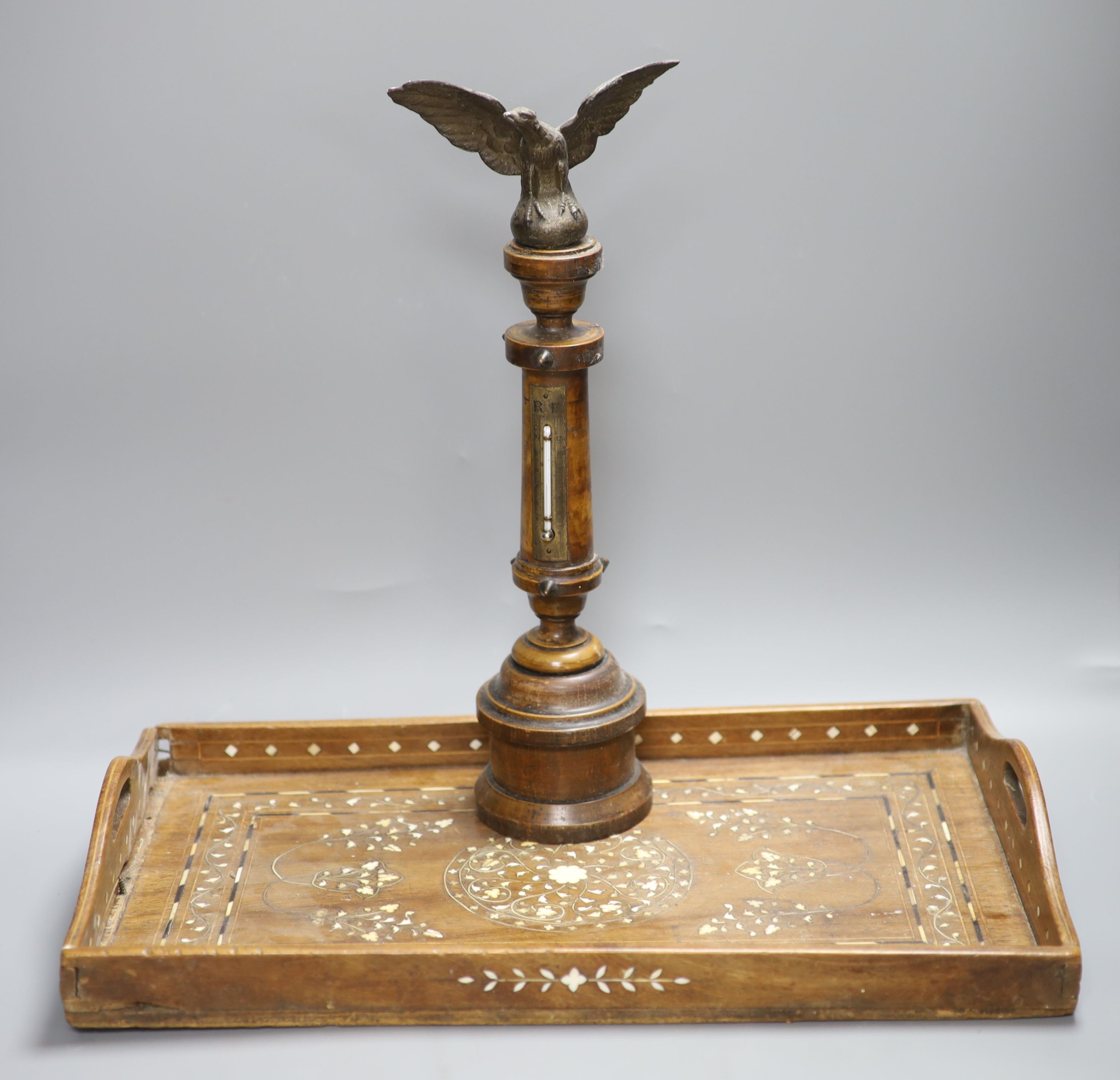 A Victorian eagle surmounted wooden columned table thermometer and an ornate inlaid tray, length