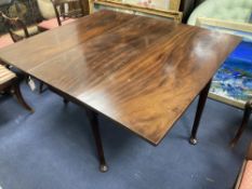 An 18th century mahogany drop-flap pad foot dining table, length 136cm extended, width 117cm, height