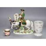 A Continental porcelain figure group, an overlaid glass goblet and a Royal Crown Derby miniature