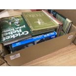 A quantity of cricket-related books