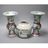 A pair of Chinese famille verte vases, height 24cm, and a jar