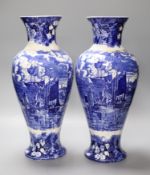 A pair of Wedgwood 'Ferrara' blue and white vases, height 38cm