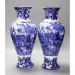 A pair of Wedgwood 'Ferrara' blue and white vases, height 38cm