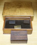 A display box, three snuff boxes, a Victorian brass bound oak document box and a coromandel box