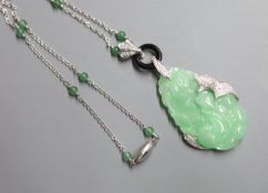 A modern Italian 750 white metal, carved jadeite, black onyx and diamond set pendant necklace,