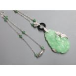 A modern Italian 750 white metal, carved jadeite, black onyx and diamond set pendant necklace,