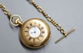 An American Waltham 10ct yellow metal half hunter keyless pocket watch, on a 9ct gold albert, pocket