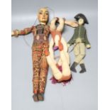 A Spanish / South American articulated marionette and two other toys