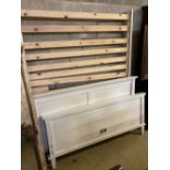 A contemporary white painted five foot bedframe, headboard height 102cm