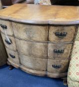 A Queen Anne revival walnut bow front three drawer chest, width 76cm, depth 50cm, height 77cm