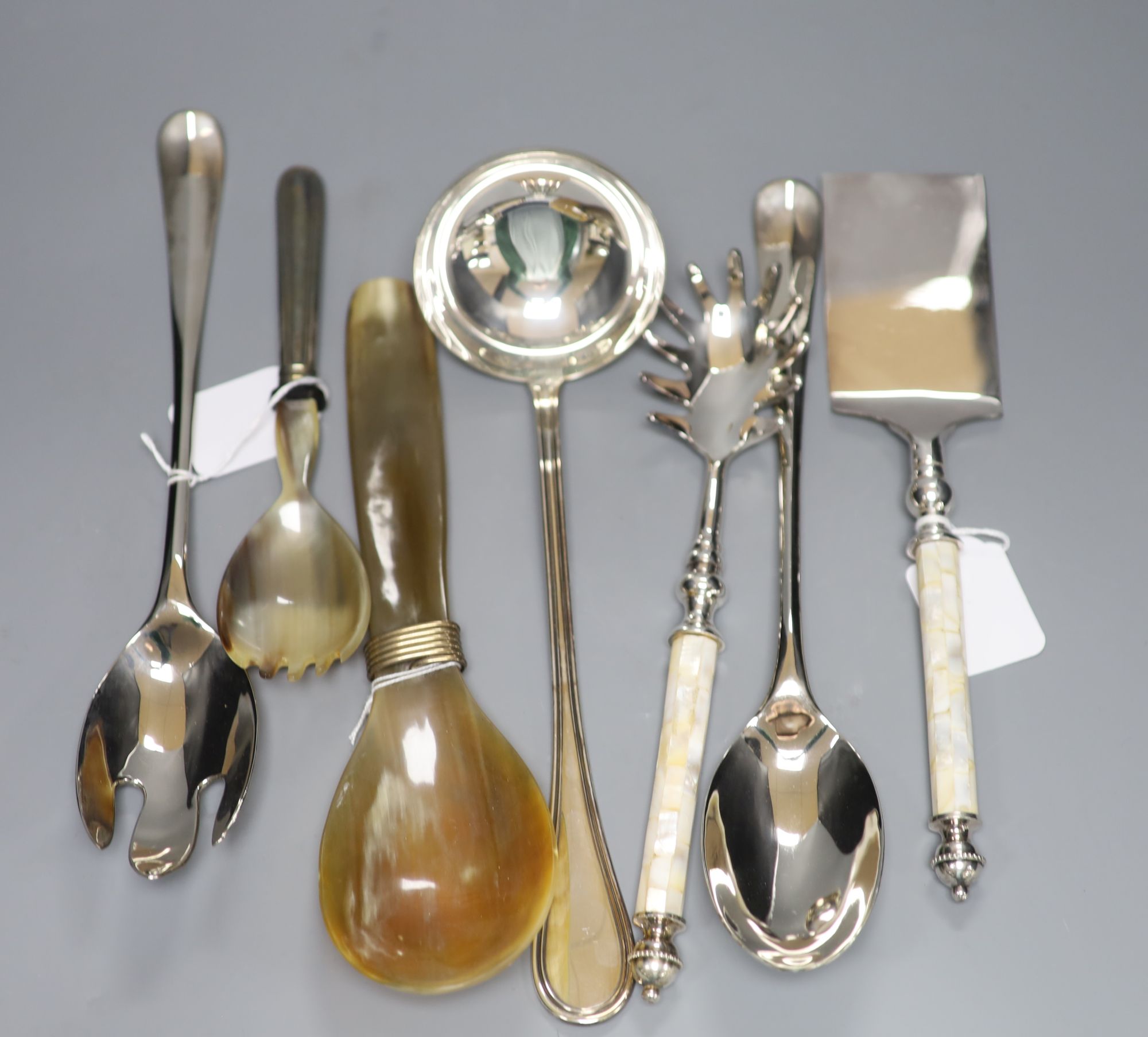 An 800 standard silver ladle and various serving items, including a pair of modern plated salad