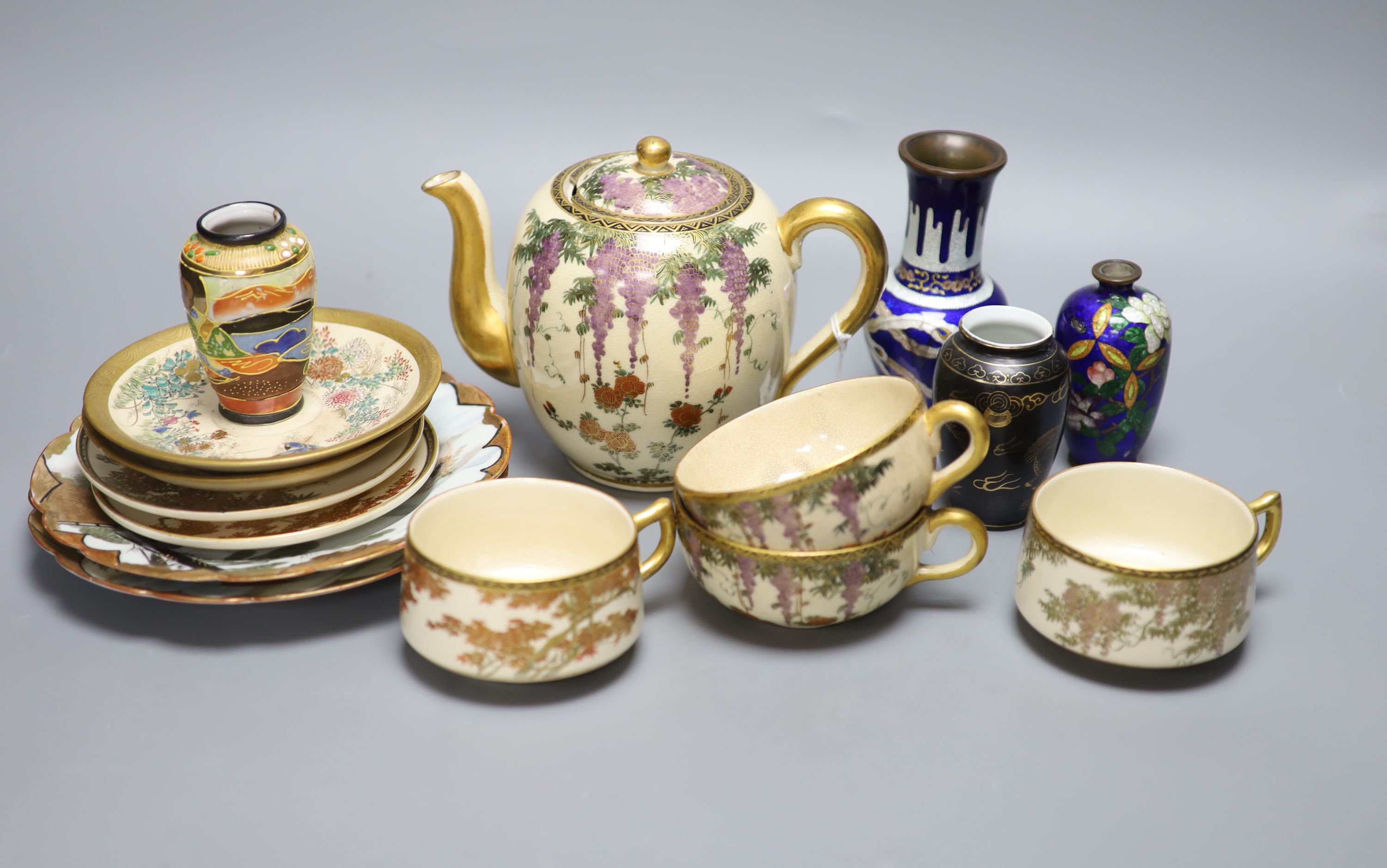 A group of Japanese cloisonne and satsuma wares