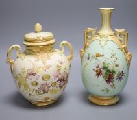 A Worcester blush ivory floral lidded jar and a similar floral vase, late 19th century, tallest 24.