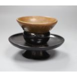 A Chinese Tenmoku tea bowl, diameter 9.5cm, and a lacquer stand