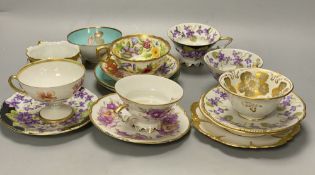 A collection of Continental porcelain tea cups and saucersCONDITION: Rockingham cup and saucer