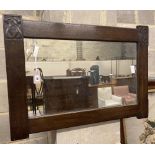 A Liberty rectangular carved oak wall mirror, width 91cm height 64cm