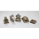 A group of Chinese bronze seals and a white metal elephant