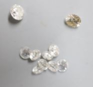 Two unmounted round cut diamonds, weighing 0.28ct and 0.35ct and eight other unmounted round cut