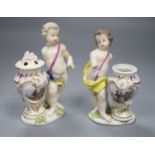 A pair of 18th century Meissen figures of putti and vases, height 14cm