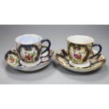 A pair of Samson copies of First Period Worcester porcelain cups and saucers, height 6cm