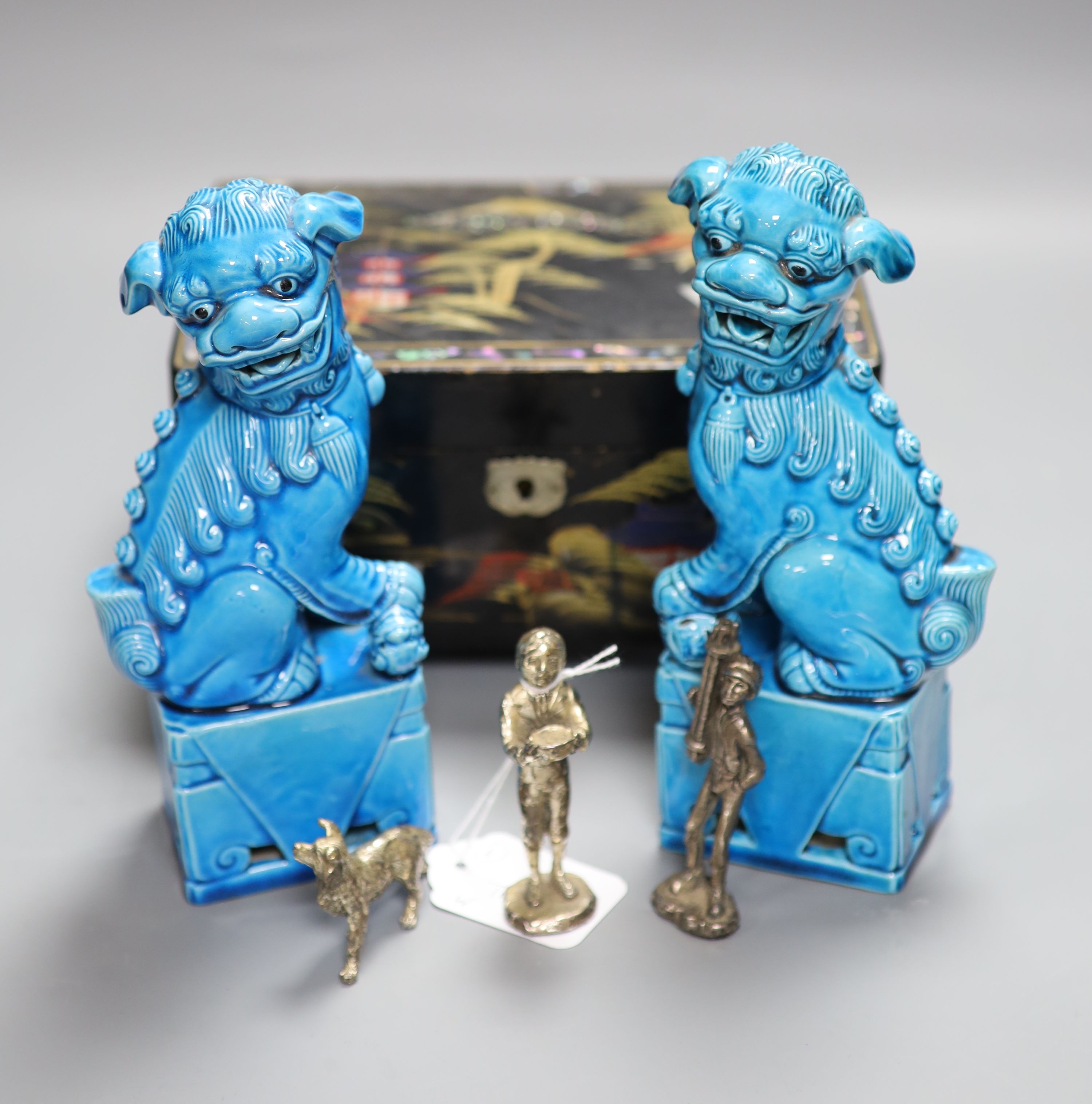 A pair of Chinese turquoise-glazed lion dogs, a lacquered jewellery box and three plated miniature