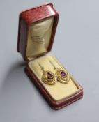 A pair of Victorian yellow metal and garnet set oval drop earrings, 18mm, gross 4 grams.CONDITION: A