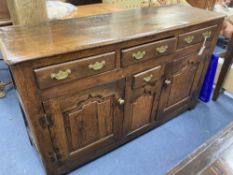 A mid 18th century oak dresser base, length 140cm, depth 46cm, height 86cm