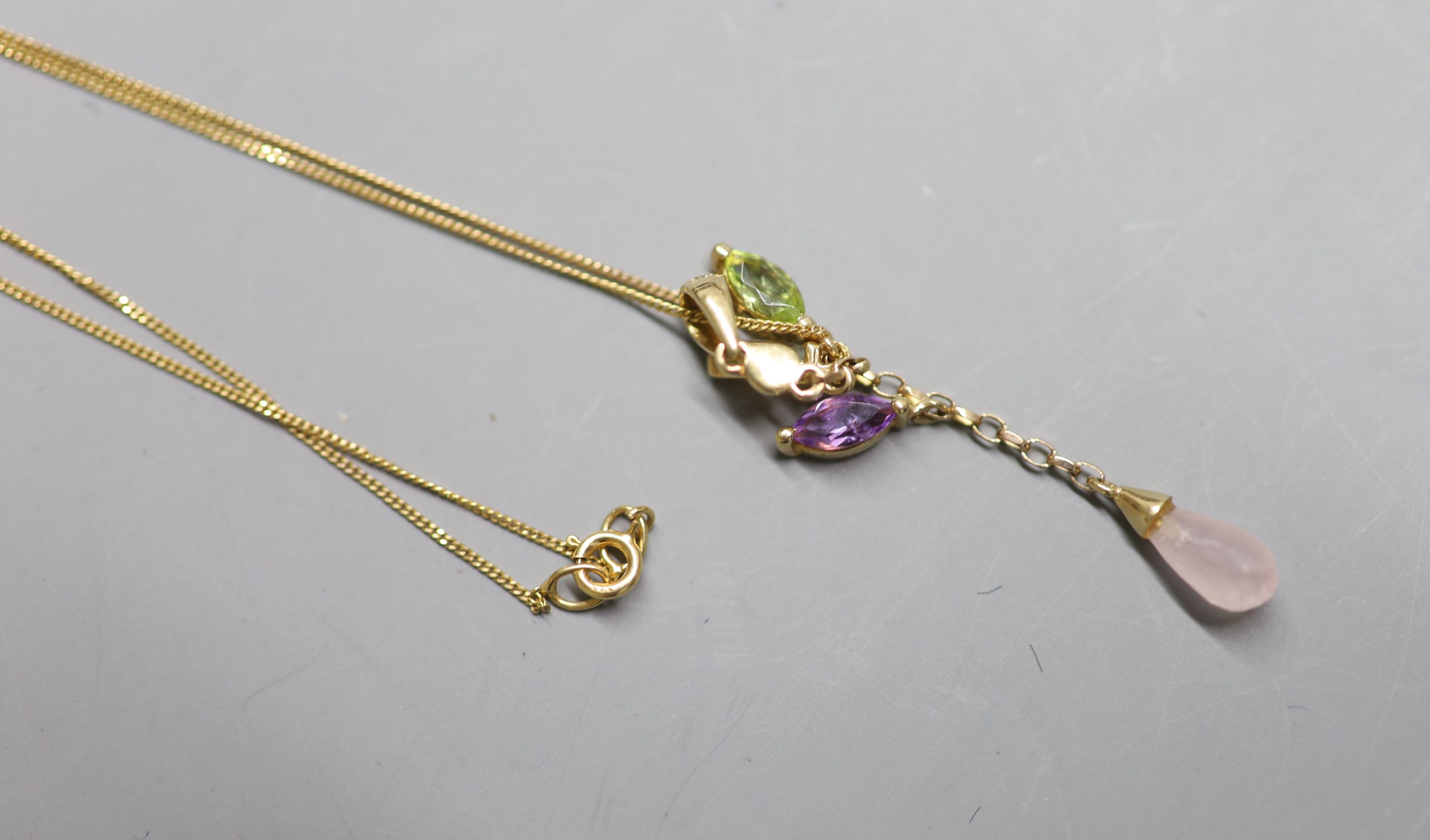 A modern 9ct gold and multi gem set drop pendant, 38mm, on a 9ct gold fine link chain (knotted),