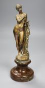 An early 20th century polished bronze figure of a classical maiden,25cm. signed W.Gorlin?