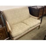 A Wesley Barrell beech two seater settee, width 140cm depth 84cm height 96cm