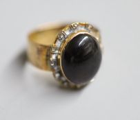 A Victorian 18ct gold, cabochon garnet and rose cut diamond set dress ring, size L, gross 7.4