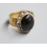 A Victorian 18ct gold, cabochon garnet and rose cut diamond set dress ring, size L, gross 7.4