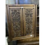 A late 19th century carved oak panel, width 72cm height 84cm