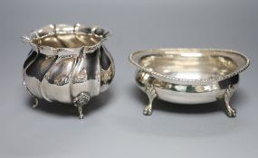 An Italian 800 standard silver oval sugar bowl and a similar circular fluted lobed bowl, the