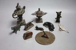 A collection of bronze and metal animals, sun dial and lidded urns etc