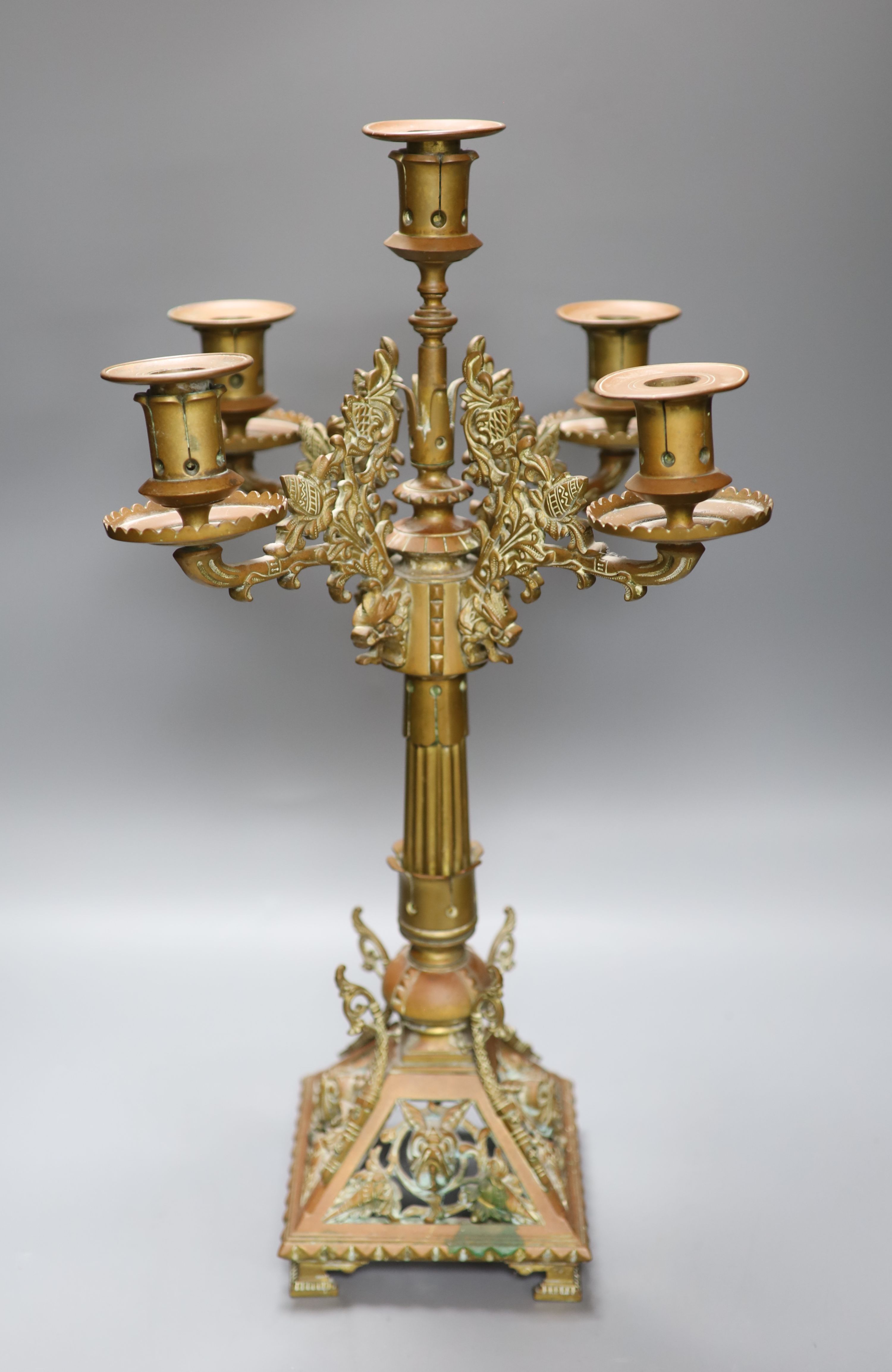 A late 19th century five light gilt bronze candelabrum, in the manner of Dresser, height 57cm