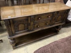 An 18th century style oak sideboard, length 150cm, depth 46cm, height 93cm