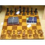 A Staunton style boxwood chess set, a chess board and miscellaneous card games