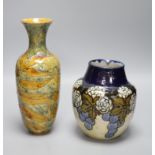 A Doulton Lambeth Autumn leaves vase and a Royal Doulton stoneware vase, tallest 27.5cm