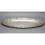 An Italian 800 standard white metal oval serving platter by Missiaglia, of shaped narrow form with