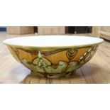 A Minton secessionist bowl, diameter 40cmCONDITION: Heavy crazing covers most of the bowl. A large