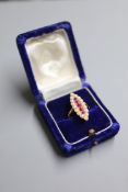 A yellow metal, ruby and split pearl cluster set marquise shaped dress ring, size Q, gross 5.8