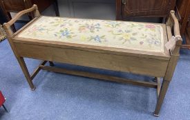 An Edwardian mahogany box seat duet piano stool, width 97cm, depth 36cm, height 61cm