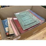 A box of car hand books