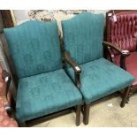 A pair of George III mahogany upholstered dining chairs (one with arms), width 62cm depth 52cm